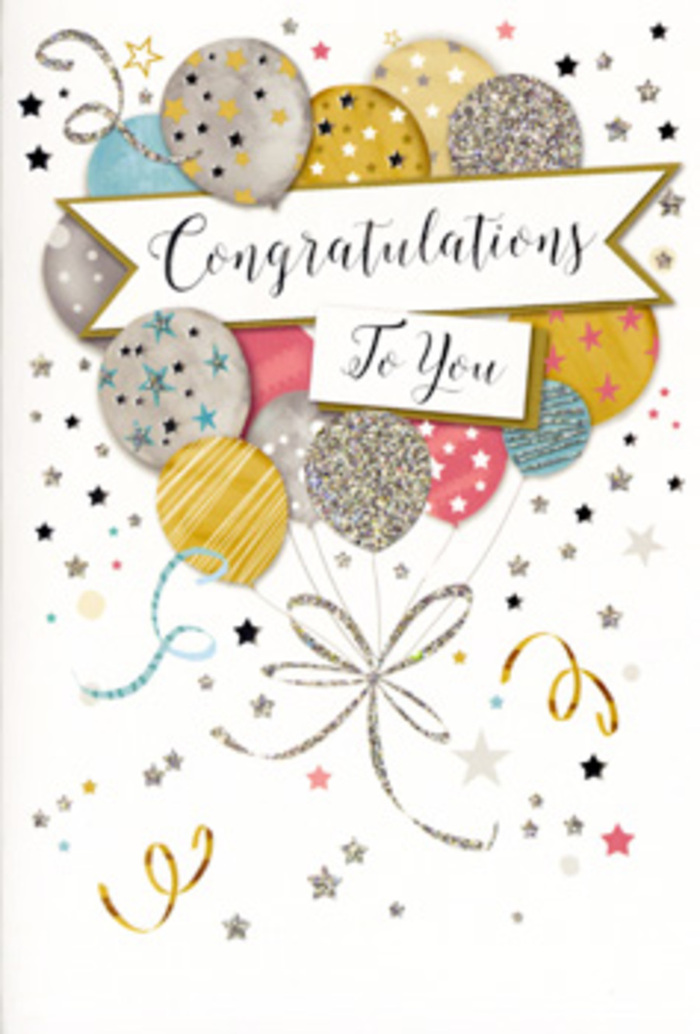 The photograph presents a refined congratulations card that seems to glow with quiet festivity, much like a well-dressed Pimlico townhouse on a special evening. Dominating the front is an artful arrangement of balloons illustrated in layers, their shapes rounded and soft, overlapping one another to create depth. They come in a harmonious mix of metallic gold, brushed silver, champagne, pastel blue, powdery pink and soft dove grey, each balloon decorated with its own character-some banded in glittering stripes, others sprinkled with star motifs or tiny shimmering confetti, suggesting texture you could almost feel. From their bases, slender gold and silver ribbons stream downwards in delicate, curling lines, then gather and overlap in a loose, whimsical knot near the bottom edge, similar to how ribbon tails trail from a florist's balloon bouquet leaving the shop for delivery around Tachbrook Street. A gently arched white banner unfurls across the centre of the balloons, edged with subtle metallic touches and bearing the message Congratulations To You in classic, flowing script, giving the card a timeless grace. Around the edges, the pale background is animated with scattered metallic stars, curling streamers and specks of confetti, evoking the feel of a surprise party where laughter lingers in the air. The balance of negative space and sparkling detail keeps the design elegant rather than overpowering, suitable for pairing with a fresh floral arrangement to celebrate graduations, promotions or personal triumphs. The whole composition conveys joy, admiration and a refined sense of celebration rooted in the understated charm of Pimlico's quiet streets.
