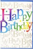 The birthday card pictured radiates pure, joyful energy, as if it has just been paired with a celebratory bouquet from a Pimlico florist. Dominating the front is a large, playful Happy Birthday greeting, written in thick, rounded letters that seem almost three-dimensional. Each letter wears its own colour, starting with rich berry reds and deep pinks, flowing into orange sherbet, bright marigold, zesty lime, and meadow green, then sliding into cool lagoon blue, vivid cobalt, and finally a soft violet at the edges. The colours blend softly where they meet, creating a sense of motion-like watching a painted sky shift above the rooftops near St George's Drive. Behind this bold rainbow phrase, a repeating layer of gold glitter script spells out Happy Birthday to you in gentle, looping lines, forming a shimmering backdrop that sparkles subtly when tilted in the light. The gold detailing feels refined rather than overpowering, much like the delicate accents a local florist adds with foliage and filler flowers to complete a showpiece arrangement. The card surface appears smooth and slightly glossy, suggesting a quality finish that would feel pleasing to the touch as someone opens it at a cosy birthday gathering in Pimlico. Though there are no extra illustrations, the combination of colour, scale, and metallic lettering creates the sense of a ready-made celebration, needing only a handwritten message inside. Perfect to accompany a hand-delivered bouquet to a flat near Victoria or a townhouse off Grosvenor Road, this card transforms a simple birthday wish into a bright, memorable moment.